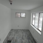 AFTER MUDDED AND PAINTED WITH NEW FLOORING